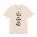 KEEP CALM AND BE KIND TO THE NEW KID T-Shirt (Soft Cream–Heather Mauve)