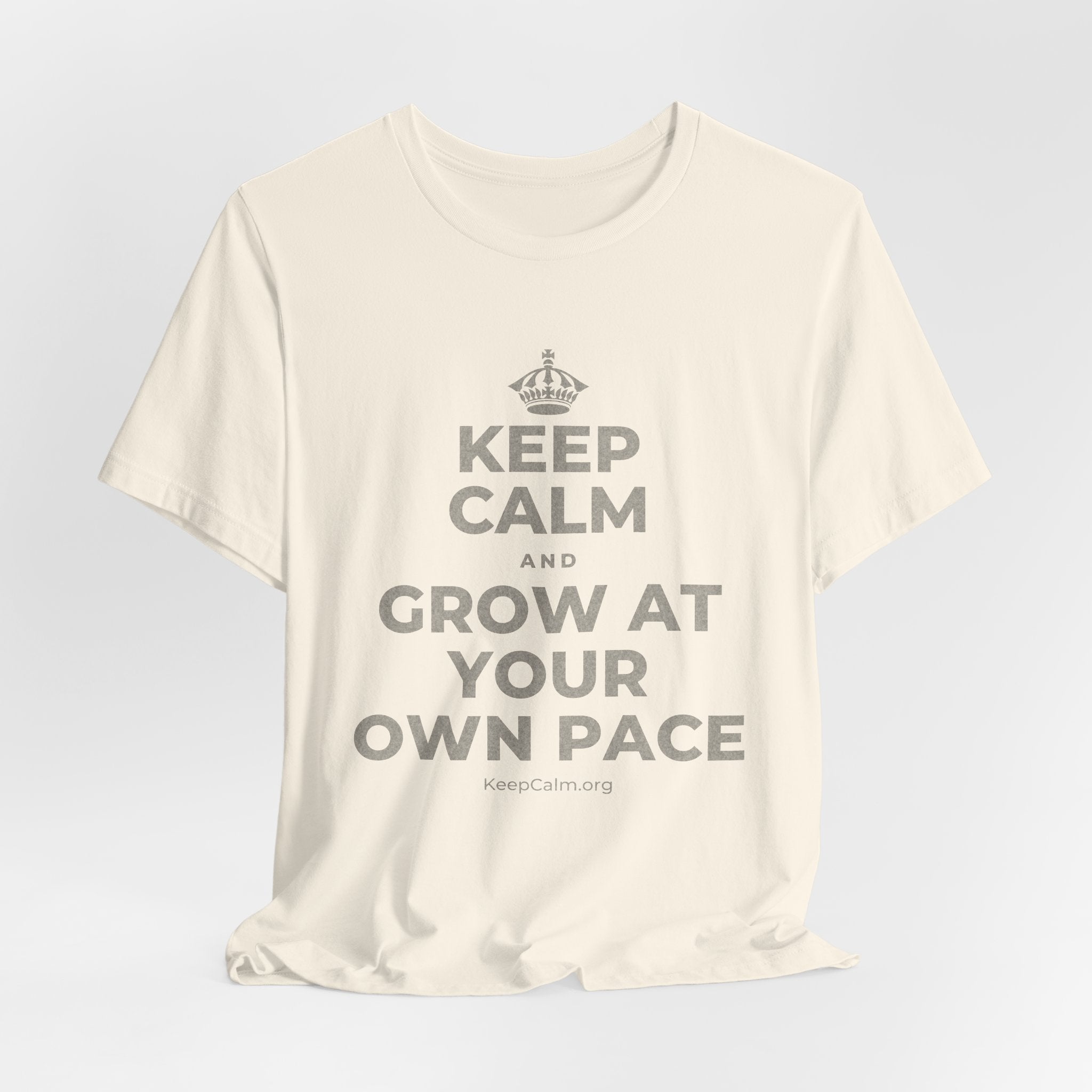 KEEP CALM AND GROW AT YOUR OWN PACE T-Shirt (White–Asphalt)