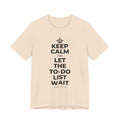 KEEP CALM AND LET THE TO-DO LIST WAIT T-Shirt (Soft Cream–Heather Mauve)